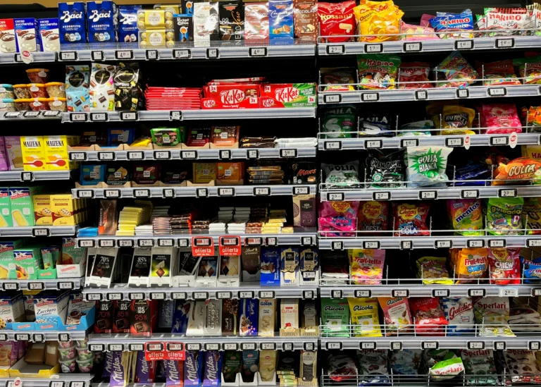 Rows of sweets and confectionery in colourful packets.